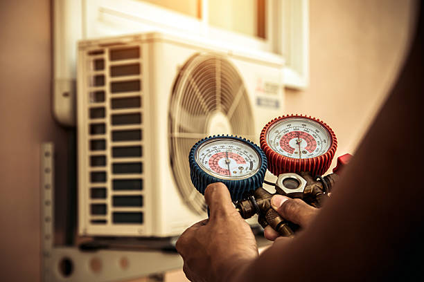 Professional Air Conditioning Service technician working in King City, MO